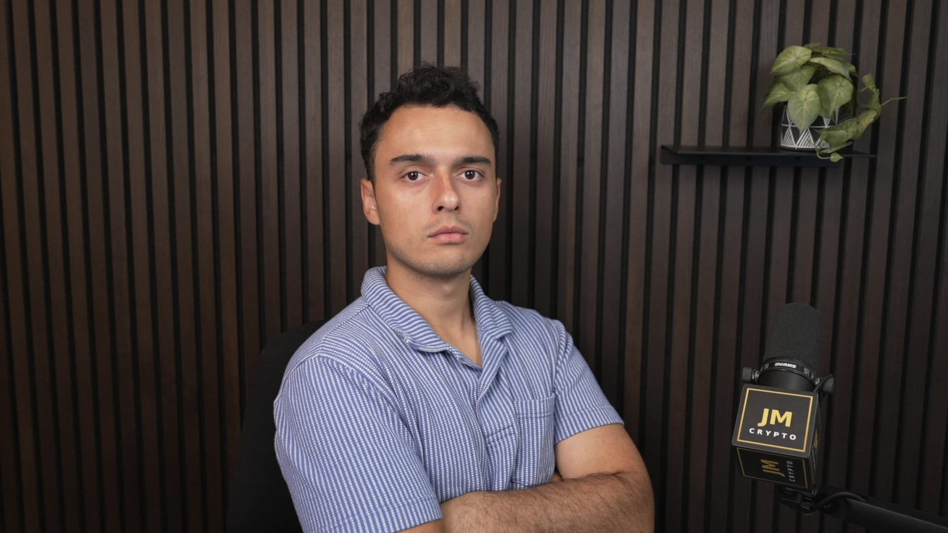 Jesus Martinez in his studio beside the JM Crypto microphone